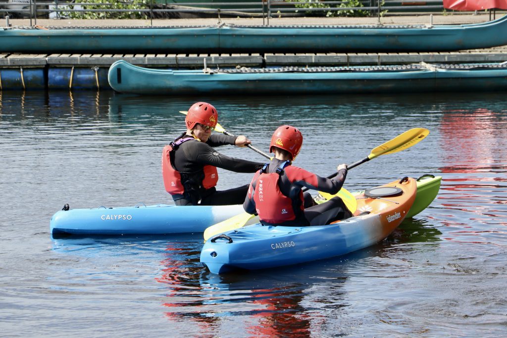 Two boys kayaking on the River Tees 